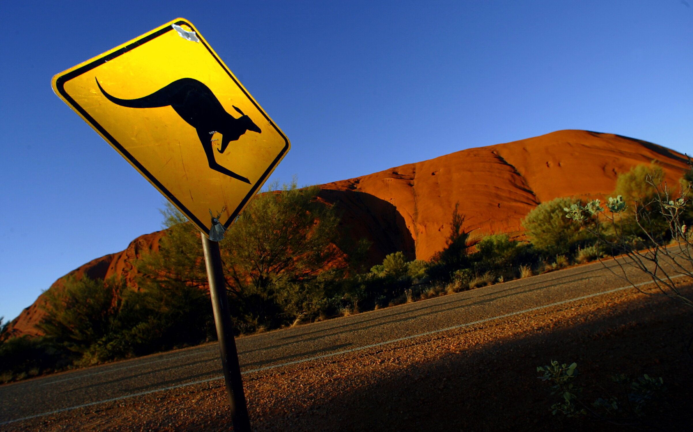Un panneau près du site d'Uluru en