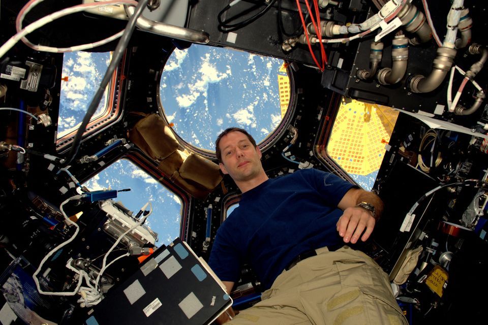 Le spationaute Thomas Pesquet à bord de la Cupola, l'un des modules européen de l'ISS /...