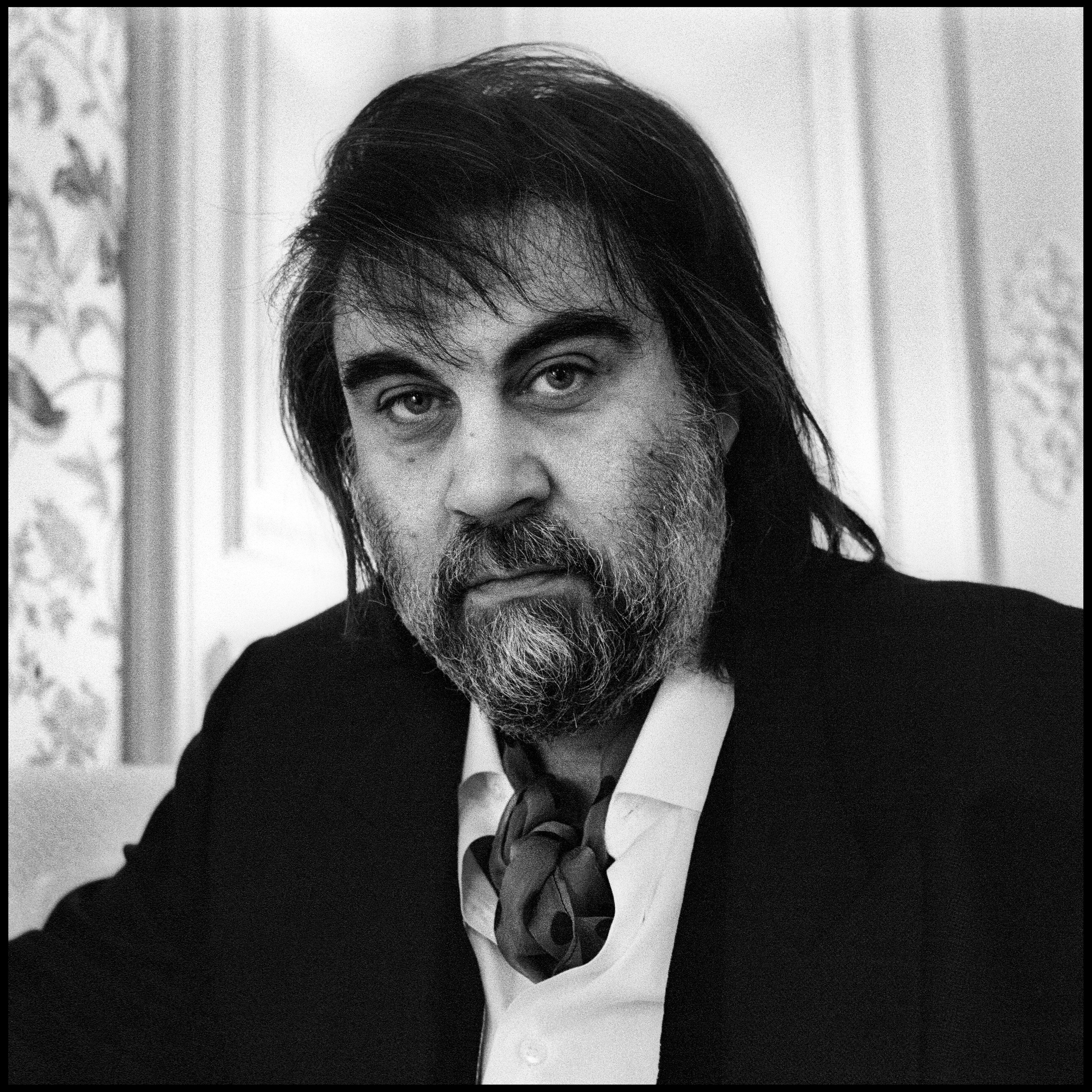 Greek composer and keyboard player Vangelis poses at his apartment in Paris, 9th June 1991. (Photo by...