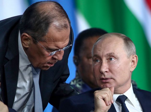 Le ministre des Affaires étrangères russe Sergueï Lavrov et Vladimir Poutine, ici...